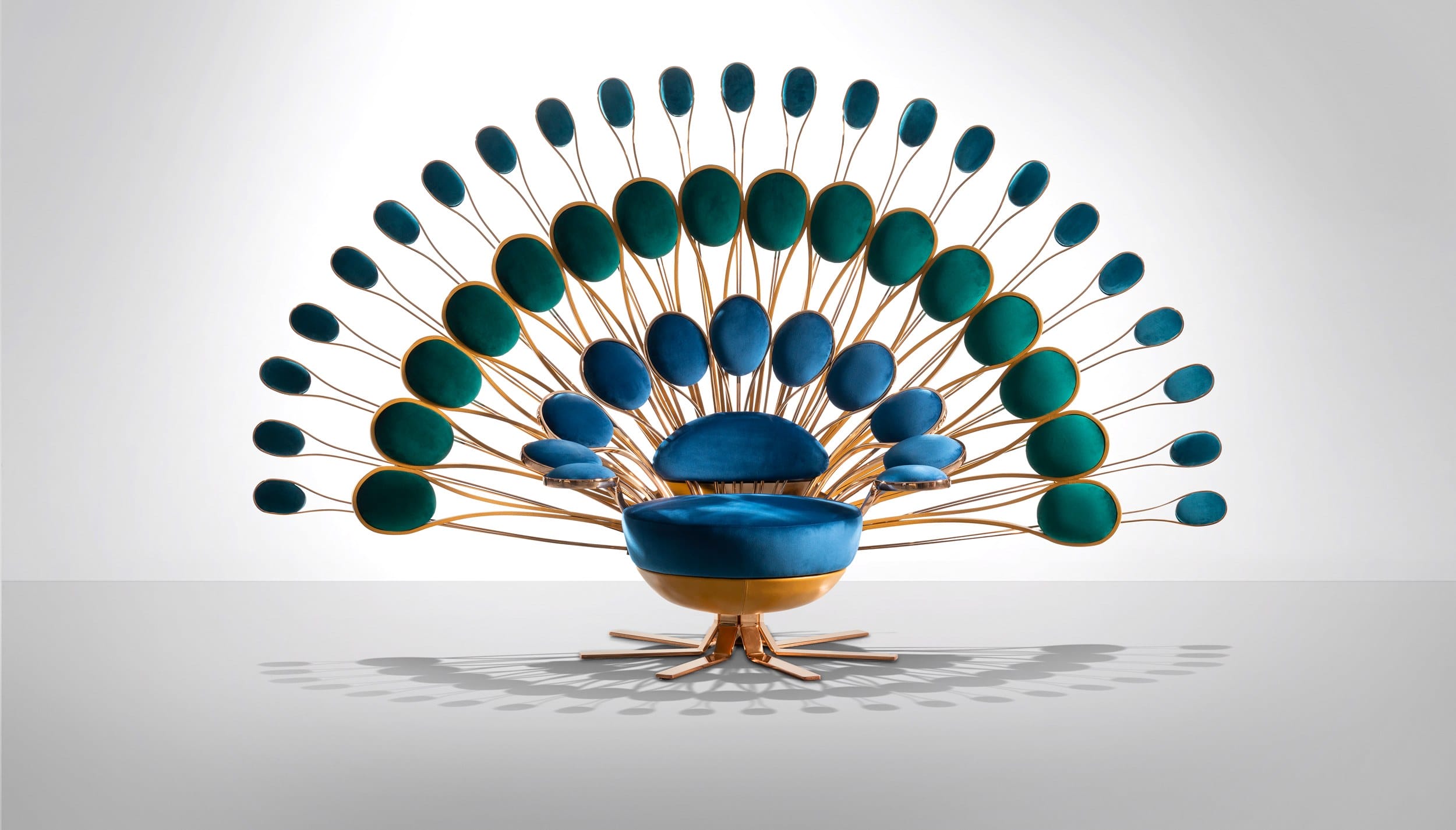 Designer Marc Ange Unveils Dazzling Peacock-Inspired Chairs in
