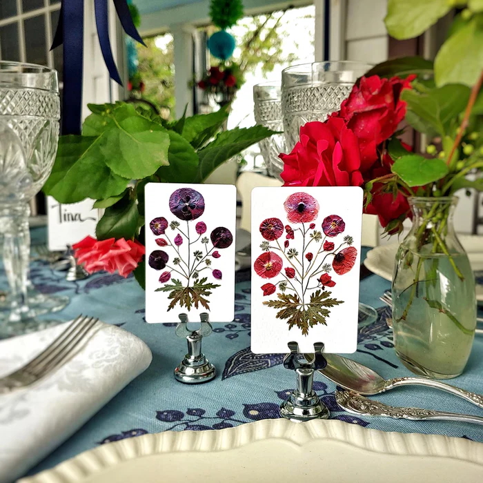 Pressed Poppies custom place cards by Marian McEvoy from The Punctilious Mr. P's Place Card Co.